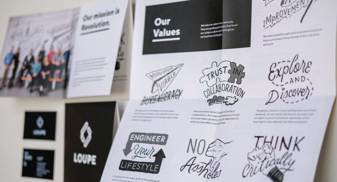 Detail of elements of Loupe brand and design collateral