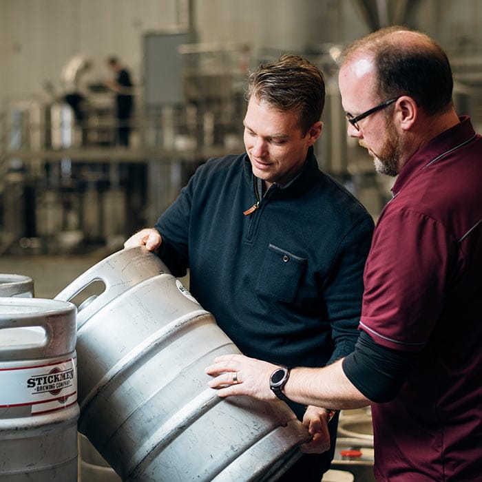 g4-kegs-team-looking-at-keg-square g4-kegs-team-looking-at-keg-square