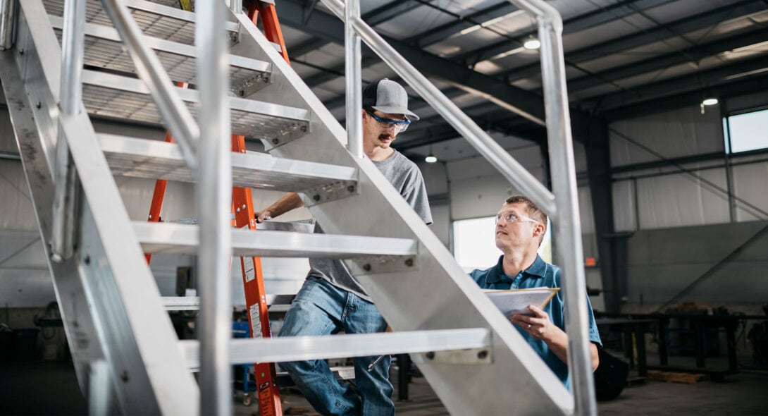 Solid Form team inspecting a staircase