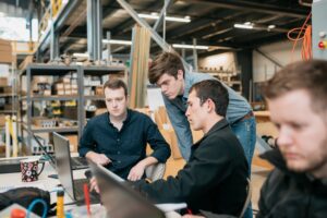 Applied Motion Systems team collaborating on a project