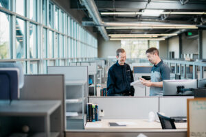 Team members laughing in office
